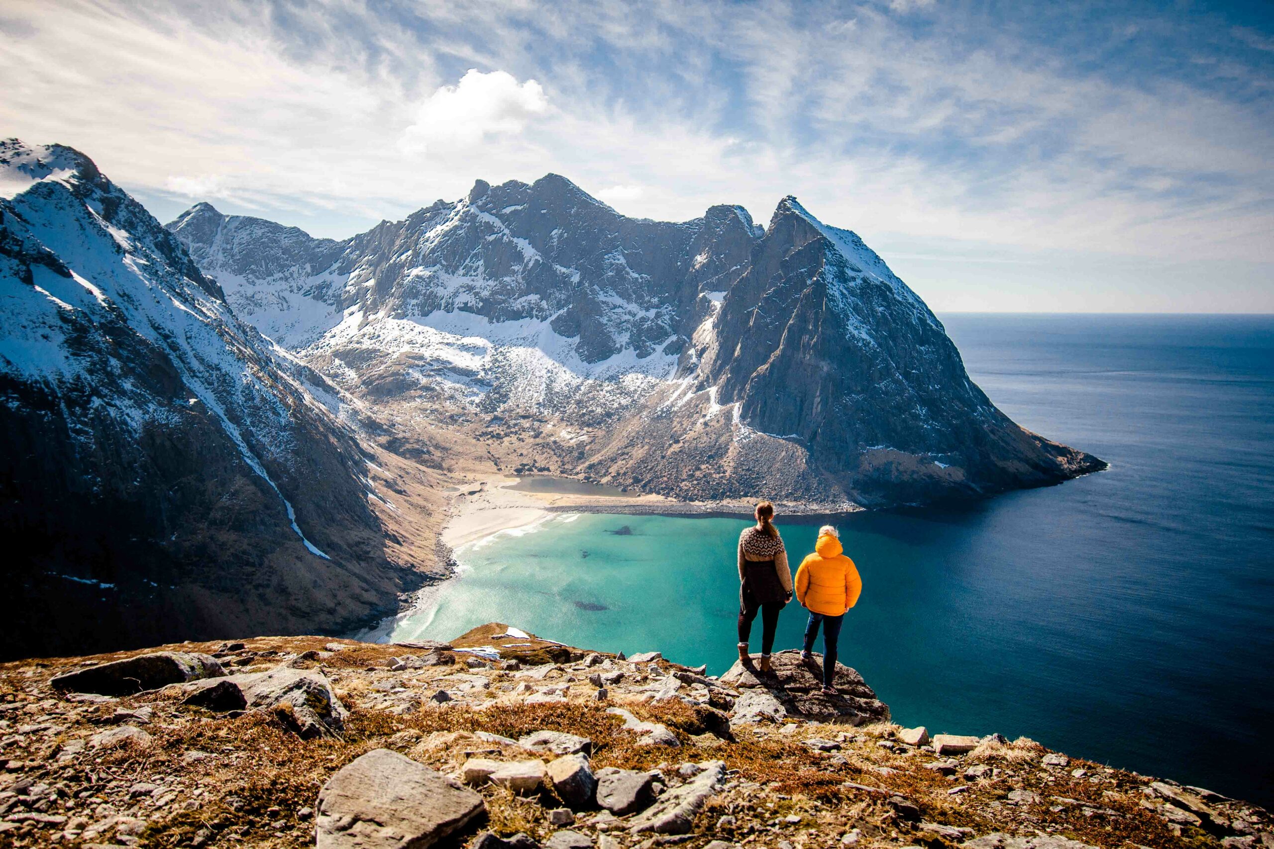 Guide showing a secret place to a guest on the Lofoten Islands